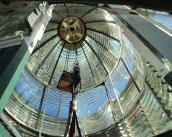 The current tower was built further inland, many yards off to prevent erosion, in the year 1874. The Fresnel lens originally was established in 1874 i